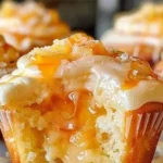 Delicious Honey Peach Cream Cheese Cupcakes topped with honey frosting