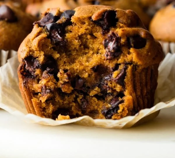 Freshly baked pumpkin muffins with spices and a golden crust