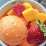 Delicious Mango Strawberry Sorbet served in a bowl, perfect for cooling off.
