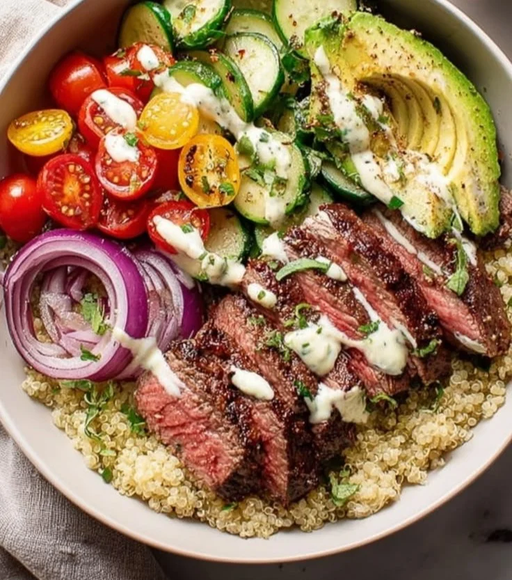 Delicious Steak Quinoa Bowl with fresh veggies and steak pieces