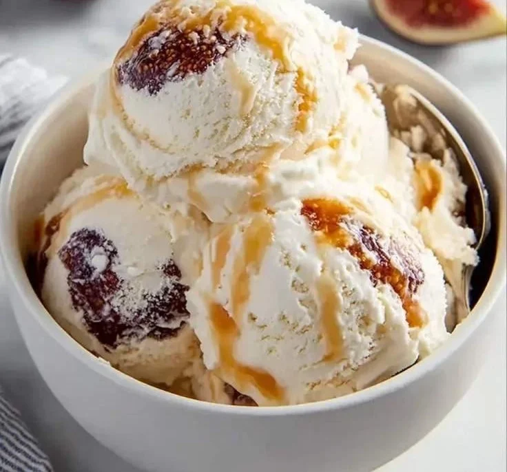 Delicious Fig Ricotta Ice Cream served in a bowl with fresh figs