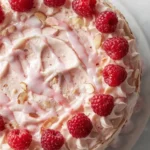 Delicious Raspberry Almond Chantilly Cake with fresh raspberries and almond cream.