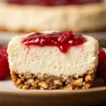 Raspberry Cream Cheese Pretzel Cups topped with fresh raspberries and cream cheese