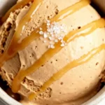 Delicious bowl of Vegan Caramel Ice Cream topped with caramel drizzle