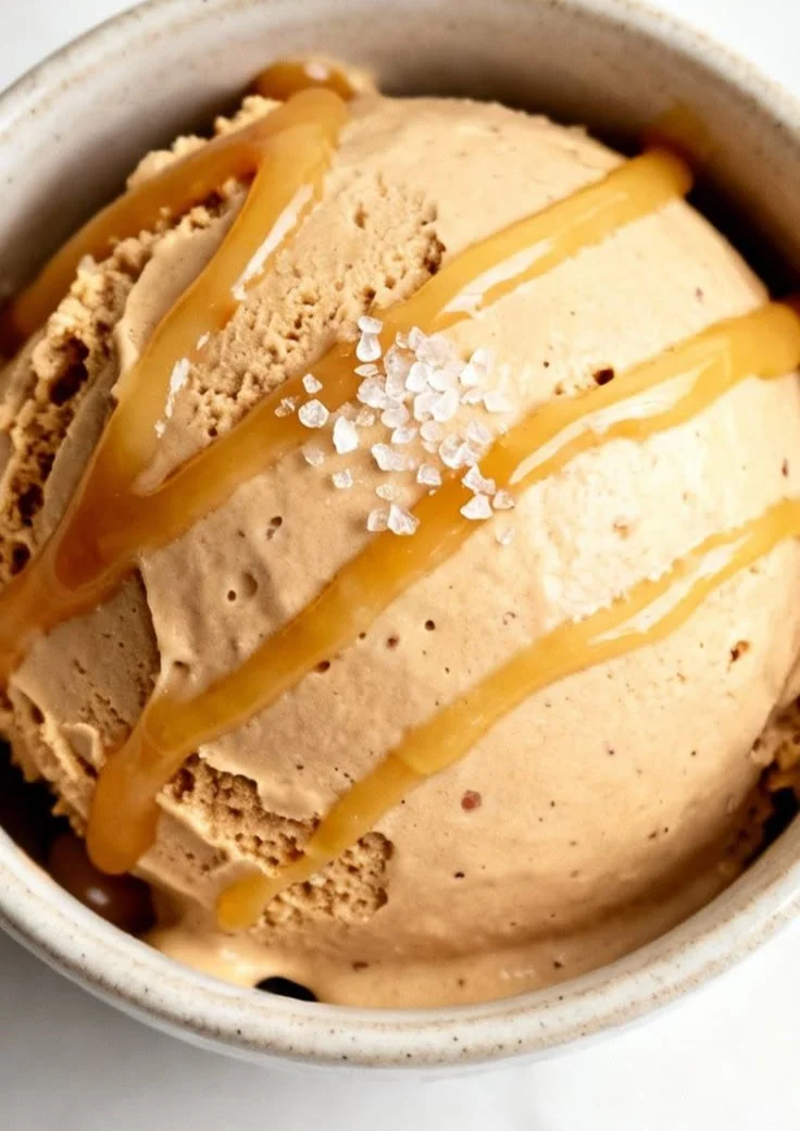 Delicious bowl of Vegan Caramel Ice Cream topped with caramel drizzle