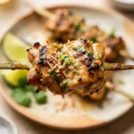 Coconut Lime Chicken Skewers with fresh lime and herbs