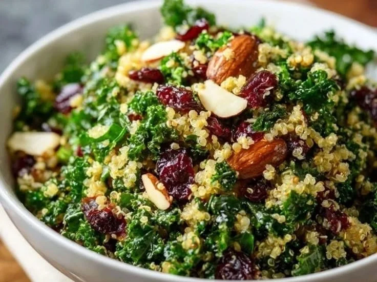 Kale Quinoa Salad with Cranberries served in a bowl